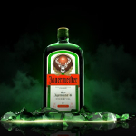Jaegermeister bottle breaking through ice